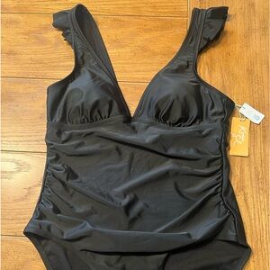 NWT women’s size Large Kona Sol black one-piece swimsuit
